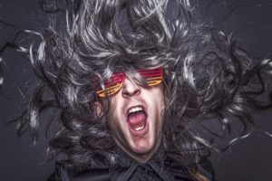 rocker with messy hair